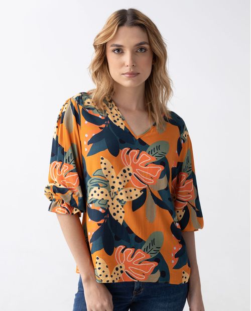 Camisa para mujer con estampado tropical y boleros en los puños