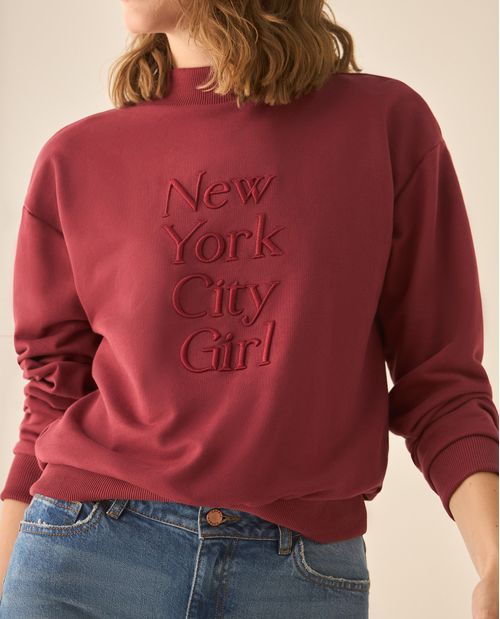 Buzo cuello redondo bordado para mujer