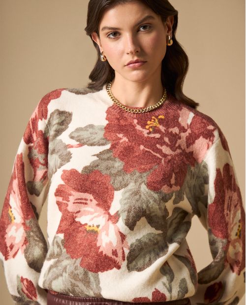 Suéter cuello redondo con estampado floral