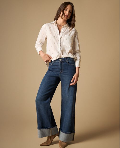 Jean wide leg cinco bolsillos con dobladillo amplio