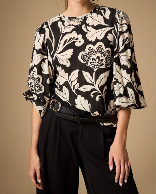 Camisa manga larga estampada cuello redondo