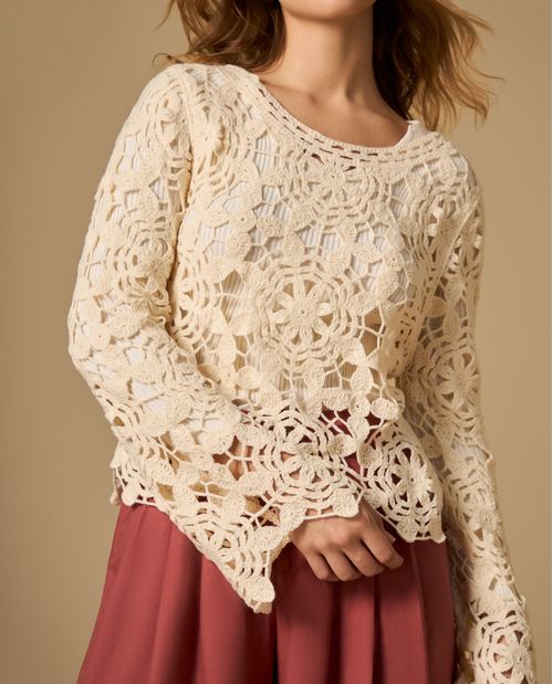 Suéter tejido cuello redondo con diseño floral