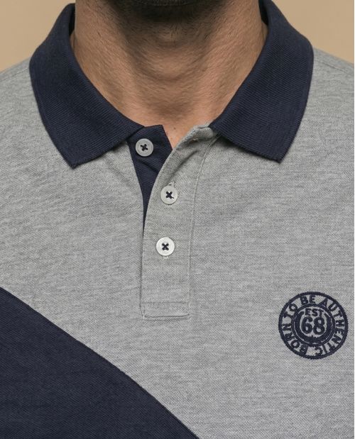 Polo manga corta bicolor con franja diagonal para hombre